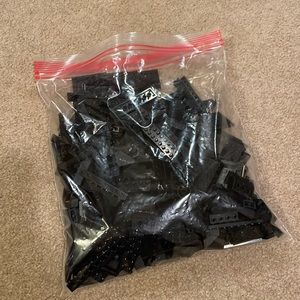 Legos. Black. Gallon bag of random bricks.